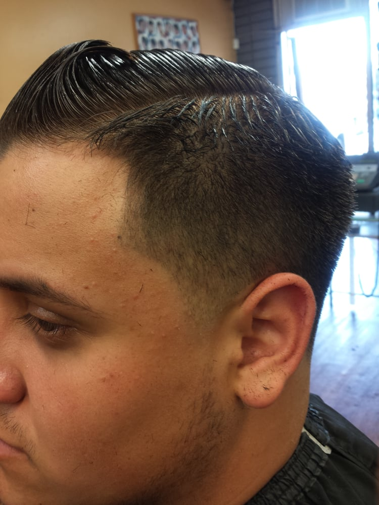 Classic pompadour with mid fade